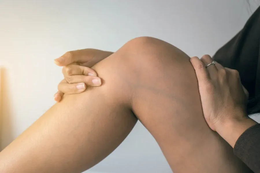 person holding his knee